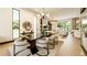Bright, open-concept living space with modern furnishings and elegant lighting at 4103 W Knights Ave, Tampa, FL 33611