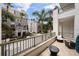 Balcony view of the neighborhood with seating area at 450 Knights Run Ave # 104, Tampa, FL 33602