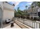 Private balcony with comfortable seating and neighborhood views at 450 Knights Run Ave # 104, Tampa, FL 33602