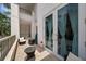 Cozy balcony with seating offering tranquil views at 450 Knights Run Ave # 104, Tampa, FL 33602