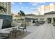 Beautiful community patio with comfortable seating areas and elegant fountains for resident's relaxation at 450 Knights Run Ave # 104, Tampa, FL 33602