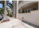 Elegant condo exterior with well-manicured landscaping, creating a welcoming curb appeal at 450 Knights Run Ave # 104, Tampa, FL 33602