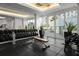 Bright gym featuring free weights, weight machines, and large windows to let in plenty of natural light at 450 Knights Run Ave # 104, Tampa, FL 33602