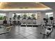 Well-equipped fitness center with treadmills and other exercise machines, providing residents with on-site workout options at 450 Knights Run Ave # 104, Tampa, FL 33602