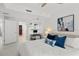 Bright main bedroom featuring a workspace and an ensuite bathroom at 450 Knights Run Ave # 104, Tampa, FL 33602