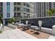 Inviting patio with stylish seating area and decorative water features at 450 Knights Run Ave # 104, Tampa, FL 33602