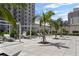Relaxing pool deck featuring lounge chairs and shaded cabanas at 450 Knights Run Ave # 104, Tampa, FL 33602