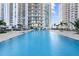 Stunning outdoor pool offering a refreshing escape and views of the city skyline at 450 Knights Run Ave # 104, Tampa, FL 33602
