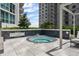 Close-up of the jacuzzi featuring spa rules at 450 Knights Run Ave # 104, Tampa, FL 33602