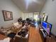 Bright living room with lots of space and natural light from the sliding glass door at 4558 Morningside # 43, Sarasota, FL 34235