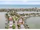Waterfront property features a private dock, neighborhood beach access and expansive views of the surrounding bay at 464 20Th Ave, Indian Rocks Beach, FL 33785