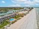 Stunning aerial shot of beachfront condos and picturesque canal in Indian Rocks Beach at 464 20Th Ave, Indian Rocks Beach, FL 33785