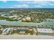 Breathtaking aerial view of waterfront condos with pools along the sandy Indian Rocks Beach at 464 20Th Ave, Indian Rocks Beach, FL 33785