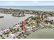 The waterfront home has a private dock and expansive views of the open water, bay and beachfront at 464 20Th Ave, Indian Rocks Beach, FL 33785