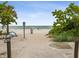Inviting beach access with dolphin-shaped shower and scenic views of Indian Rocks Beach at 464 20Th Ave, Indian Rocks Beach, FL 33785
