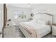 Inviting bedroom with rustic furniture, creating a warm and comfortable atmosphere at 464 20Th Ave, Indian Rocks Beach, FL 33785
