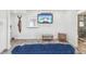 Comfortable living room space with modern decor, a flat-screen TV, and access to a bathroom at 464 20Th Ave, Indian Rocks Beach, FL 33785
