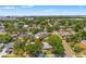 Scenic aerial view of the property nestled in a leafy residential area at 4701 W Wyoming Ave, Tampa, FL 33616