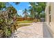 View of the backyard featuring a grill, patio, and fencing at 4701 W Wyoming Ave, Tampa, FL 33616