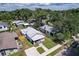 Overhead view showcasing a charming neighborhood with tree-lined streets and well-maintained homes at 508 N Walker St, Plant City, FL 33563