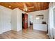 Bright bedroom with paneled wood ceiling, built-in closet and dresser at 508 N Walker St, Plant City, FL 33563