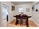 The dining room has hardwood floors and a dark wood table at 508 N Walker St, Plant City, FL 33563