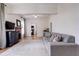 Bright living room with hardwood floors, fireplace, and comfortable seating area at 508 N Walker St, Plant City, FL 33563