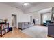 Bright living room with hardwood floors and an open layout to the rest of the home at 508 N Walker St, Plant City, FL 33563