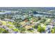 Aerial view of the home with lush greenery and a swimming pool at 5925 18Th Ne St, St Petersburg, FL 33703