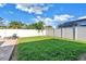 A backyard is fenced in for privacy and includes a patio area. Great for relaxation and enjoying the outdoor space at 5925 18Th Ne St, St Petersburg, FL 33703