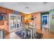 Dining area open to kitchen and adjacent to sliding doors to the outdoor pool at 5925 18Th Ne St, St Petersburg, FL 33703