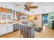Dining area near the kitchen with slider doors leading to the outdoor living space at 5925 18Th Ne St, St Petersburg, FL 33703