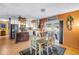 Dining area next to kitchen with a view of the outdoors through sliding doors at 5925 18Th Ne St, St Petersburg, FL 33703