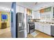 Modern kitchen features stainless steel appliances and lots of natural light at 5925 18Th Ne St, St Petersburg, FL 33703
