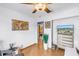 Bright office with hardwood floors, stylish decor, and a television at 5925 18Th Ne St, St Petersburg, FL 33703