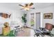 Bright office featuring a work desk, a lounge chair, and access to the outdoors at 5925 18Th Ne St, St Petersburg, FL 33703