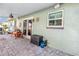 Covered patio featuring comfortable seating and ample space for relaxation near lush landscaping at 5925 18Th Ne St, St Petersburg, FL 33703