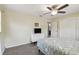 Bedroom featuring laminate floors, ceiling fan, and built-in white dresser at 5968 46Th N Ave, Kenneth City, FL 33709