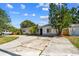 Inviting single-story house with a large driveway and mature trees in a nice neighborhood at 5968 46Th N Ave, Kenneth City, FL 33709