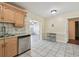 Open floor plan combining the kitchen and dining area perfect for entertaining guests at 5968 46Th N Ave, Kenneth City, FL 33709