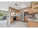 Bright kitchen features stainless steel appliances, marble countertops, and ample cabinet space at 5968 46Th N Ave, Kenneth City, FL 33709