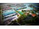 Community aerial view featuring tennis courts, ponds, and waterways, showcasing a variety of amenities at 6075 Shore S Blvd # 215, Gulfport, FL 33707