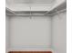 Empty reach in closet with shelving for storage and hardwood floors at 6075 Shore S Blvd # 215, Gulfport, FL 33707