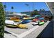 Collection of kayaks stored on racks, representing recreational opportunities and outdoor activities at 6075 Shore S Blvd # 215, Gulfport, FL 33707