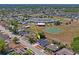 Aerial view of a cozy home near a school and surrounded by a friendly neighborhood at 6137 Halifax Dr, New Port Richey, FL 34653