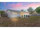 Cozy backyard with a covered patio perfect for outdoor entertaining at 6137 Halifax Dr, New Port Richey, FL 34653