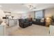 Cozy living room seamlessly integrates with kitchen and dining, perfect for modern living at 6180 Spring Crayfish Ave, New Port Richey, FL 34653