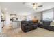 A living room that seamlessly blends with the dining area and kitchen, creating a welcoming atmosphere at 6180 Spring Crayfish Ave, New Port Richey, FL 34653