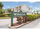 Inviting Willow Lake condo complex sign with manicured landscaping and clear community address at 6400 46Th N Ave # 203, Kenneth City, FL 33709