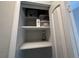 Linen closet with multiple shelves at 6407 1St Palm Pt, St Pete Beach, FL 33706